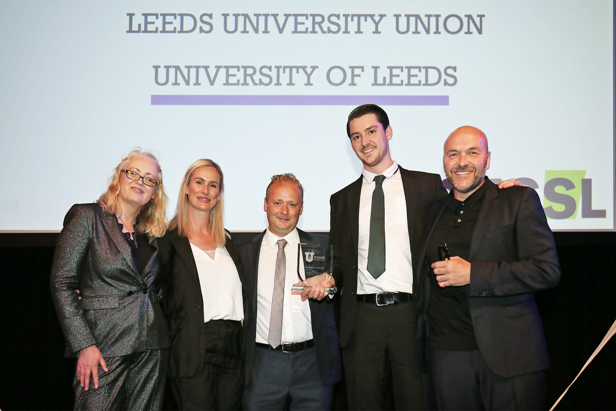 Leeds collecting UDine award